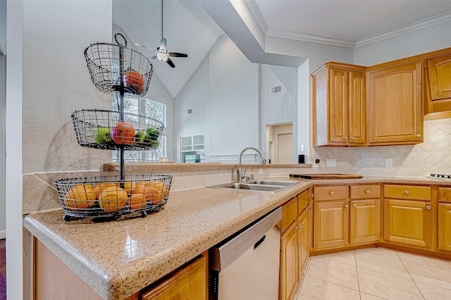 kitchen featuring dishwasher, backsplash, ceiling fan, sink, and light tile patterned flooring