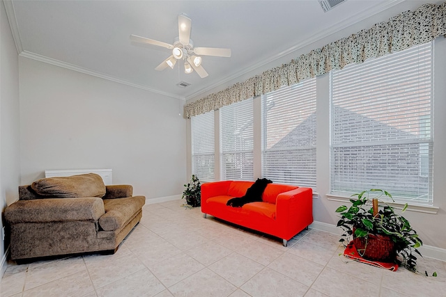 tiled living room with ceiling fan, a healthy amount of sunlight, and crown molding