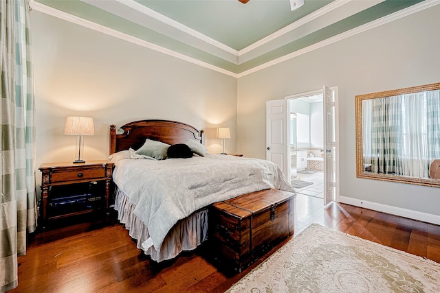 bedroom with ceiling fan, ensuite bathroom, crown molding, and dark hardwood / wood-style floors