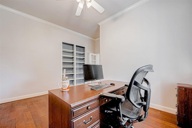 office with ornamental molding, ceiling fan, and light hardwood / wood-style flooring