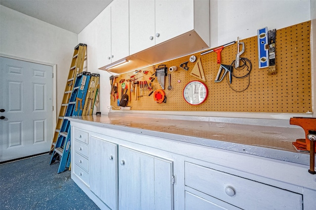 kitchen featuring white cabinets