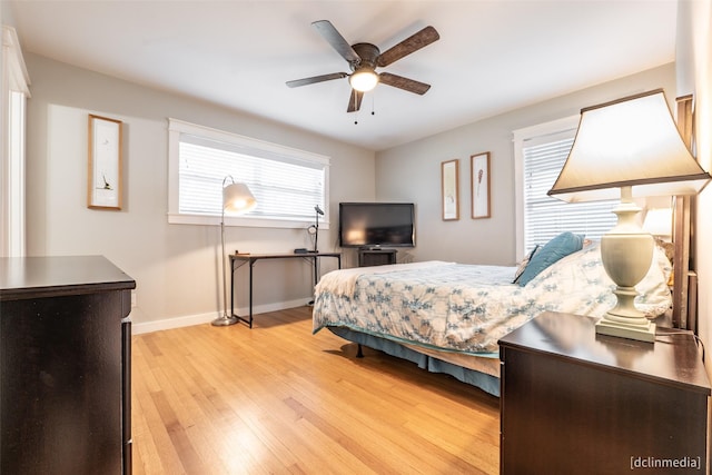 bedroom featuring ceiling fan and light wood-type flooring