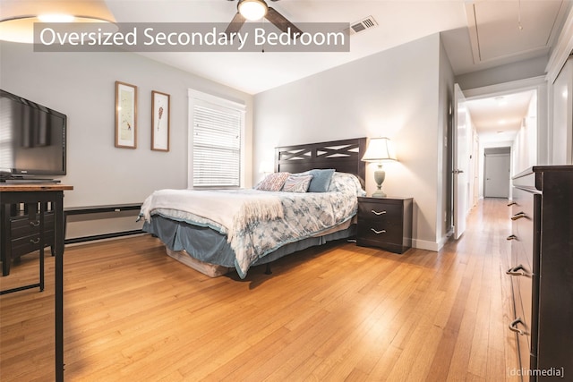 bedroom featuring light wood-type flooring and ceiling fan