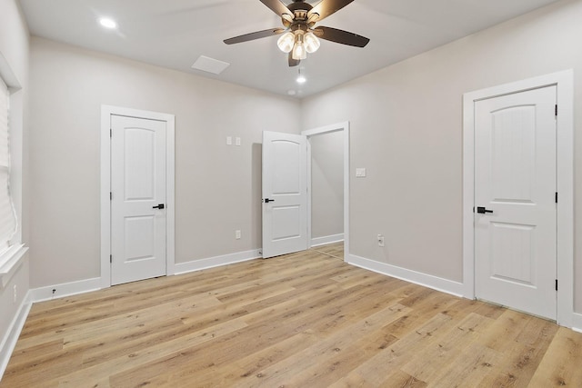 unfurnished bedroom featuring ceiling fan and light wood-type flooring