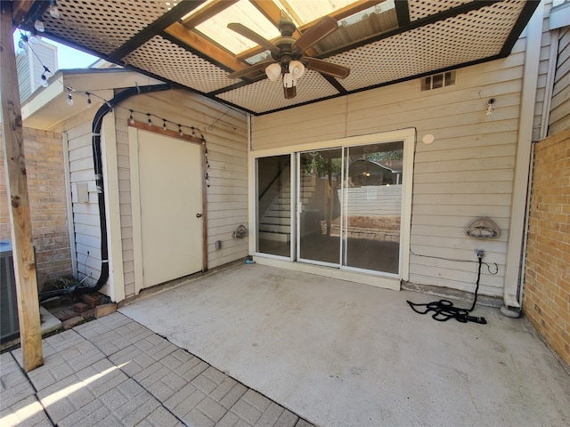 view of patio / terrace featuring ceiling fan