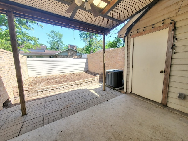view of patio / terrace featuring central AC unit and a fenced backyard