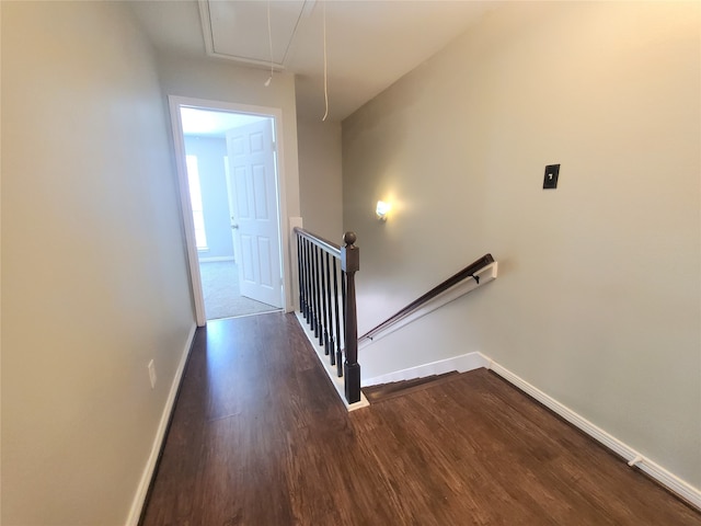 2030 Plantation Dr Unit B-2, Conroe, TX 77301 - staircase featuring attic access, wood finished floors, and baseboards