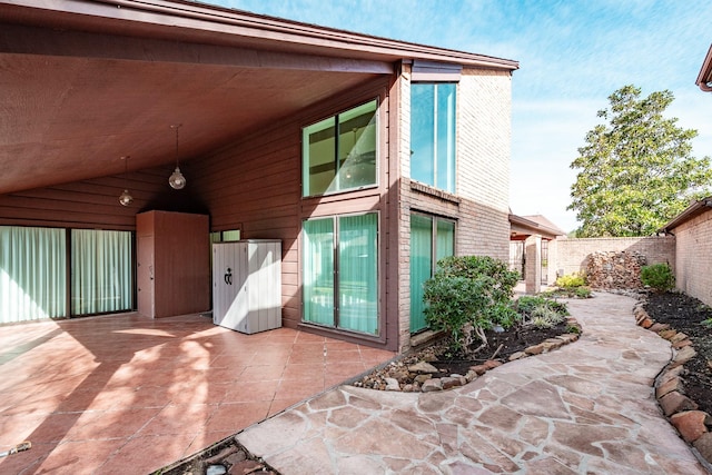 property entrance with a patio