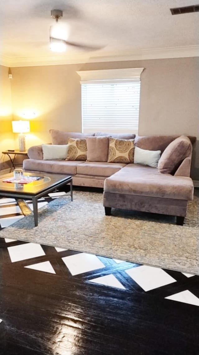 living room with ornamental molding