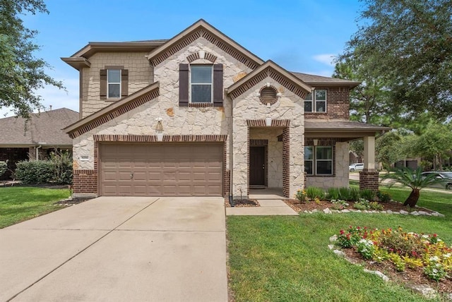 view of front of home with a front lawn and a garage