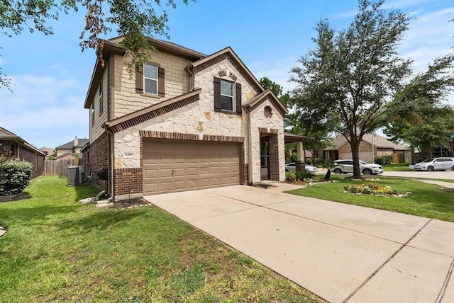 view of front of property with a front lawn, cooling unit, and a garage