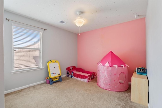 bedroom featuring carpet