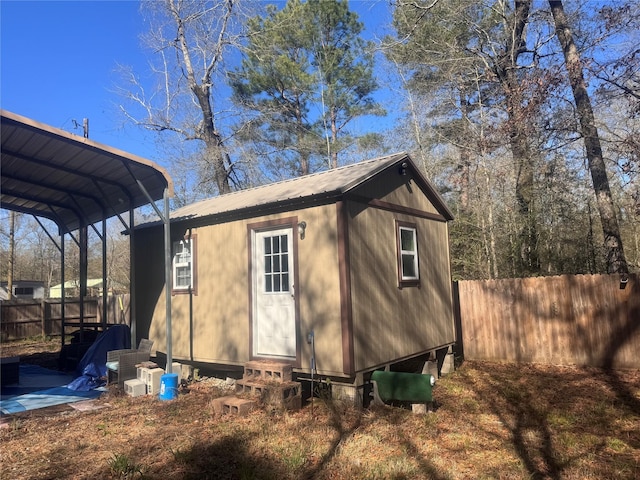 view of outdoor structure with a carport