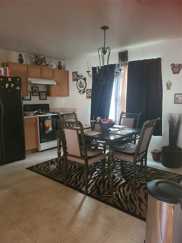 tiled dining room featuring a notable chandelier