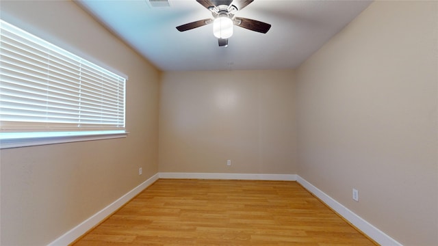 unfurnished room featuring ceiling fan and light hardwood / wood-style flooring