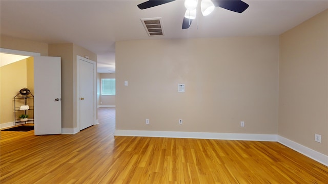 spare room with ceiling fan and light hardwood / wood-style floors