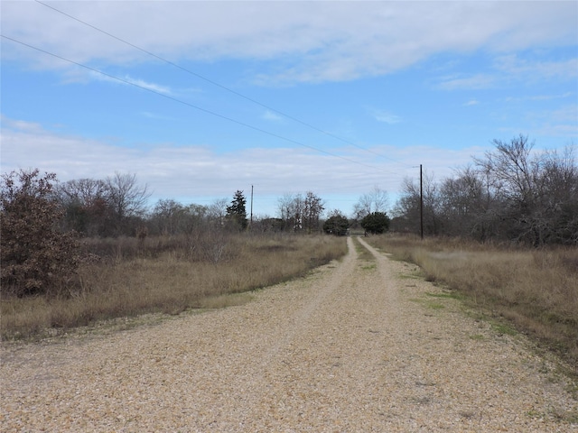 view of road with a rural view