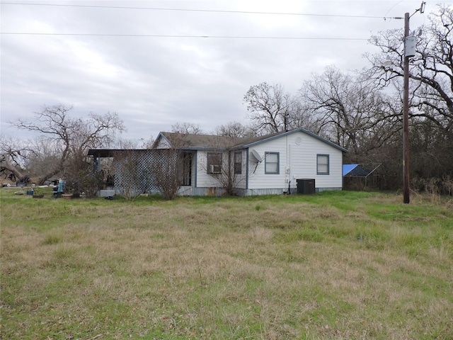 view of front of property with cooling unit