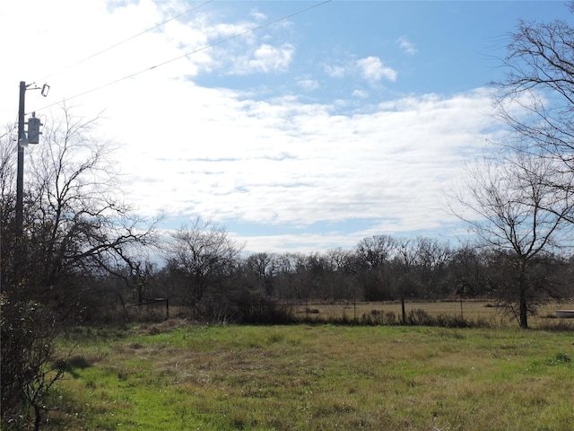 exterior space with a rural view