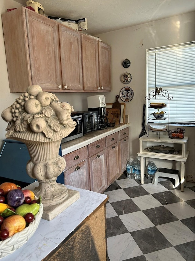 kitchen with light brown cabinetry