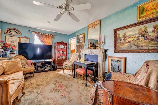 living room featuring ceiling fan