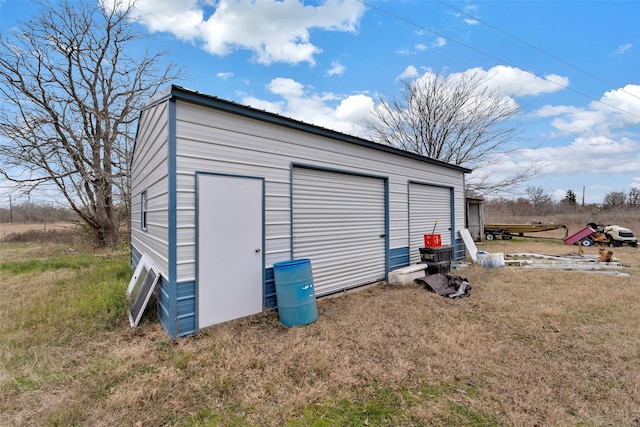 view of outdoor structure with a garage