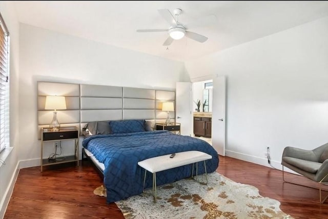 bedroom with connected bathroom, ceiling fan, and dark hardwood / wood-style floors