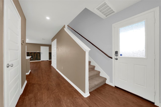 entryway featuring dark wood-type flooring