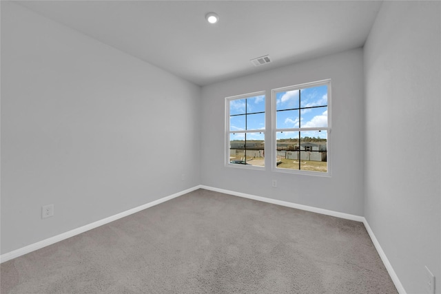 view of carpeted spare room