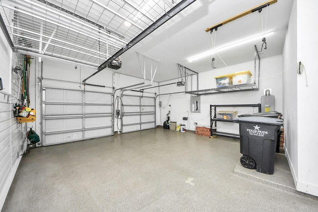 garage with electric panel and a garage door opener