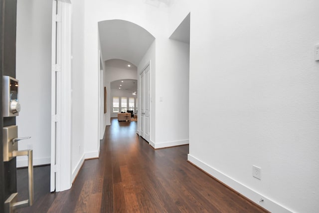 corridor featuring dark wood-type flooring