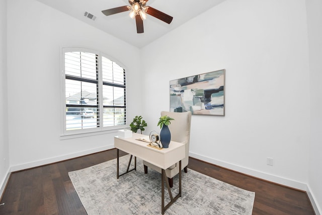 office with dark hardwood / wood-style floors, ceiling fan, and vaulted ceiling