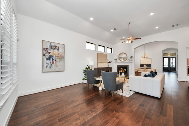 living room featuring french doors, dark hardwood / wood-style floors, ceiling fan, and lofted ceiling