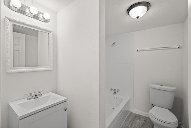 full bathroom with vanity, toilet, and shower / bathtub combination