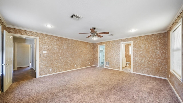 unfurnished bedroom featuring ceiling fan, carpet floors, and ornamental molding