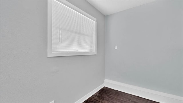 spare room featuring hardwood / wood-style floors