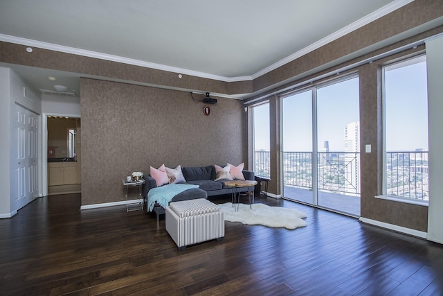 living room featuring dark hardwood / wood-style flooring and ornamental molding