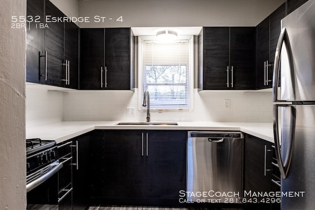 kitchen featuring backsplash, sink, and stainless steel appliances