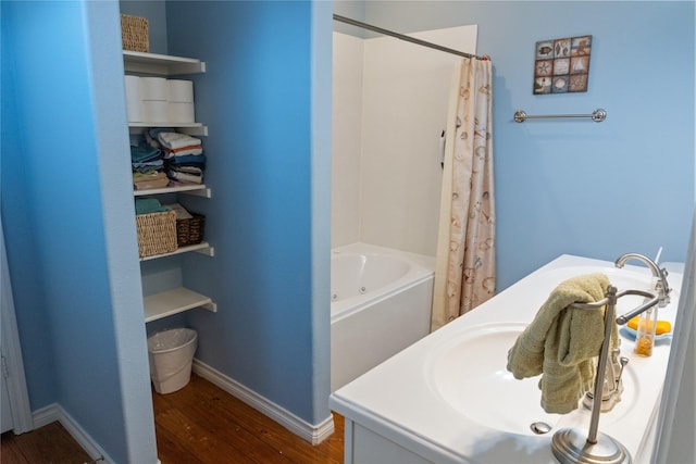 bathroom with vanity and wood-type flooring