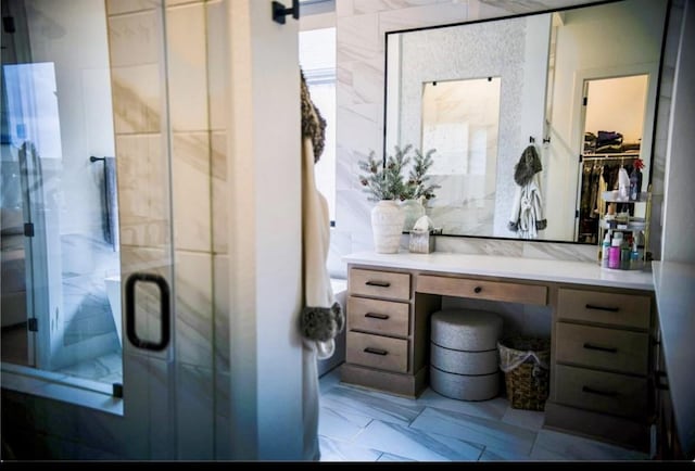 bathroom featuring vanity and walk in shower