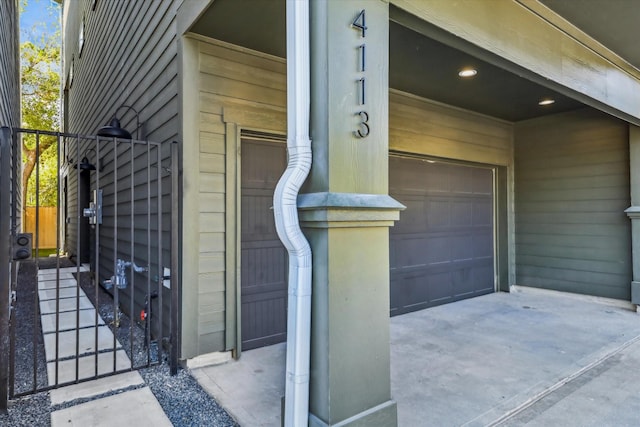 view of exterior entry featuring a garage