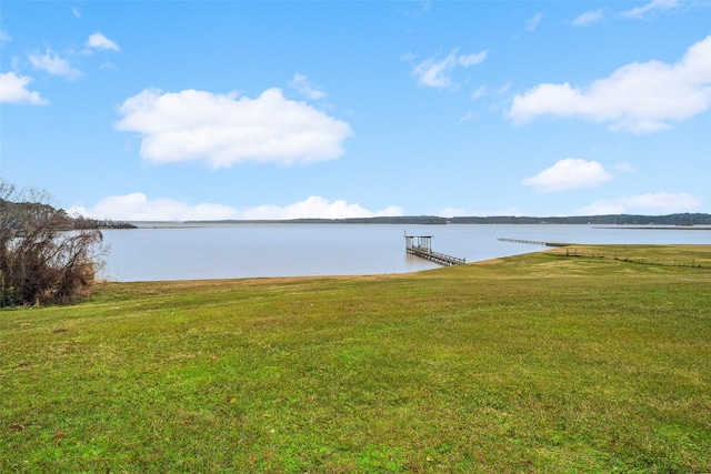 property view of water featuring a boat dock