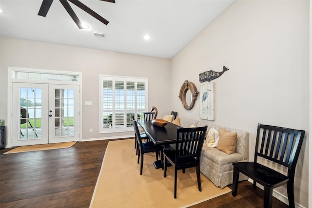 dining room with ceiling fan, french doors, and wood-type flooring