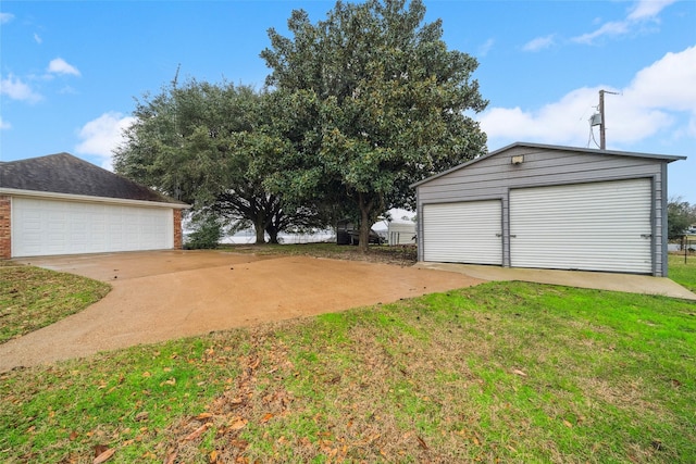 garage featuring a yard