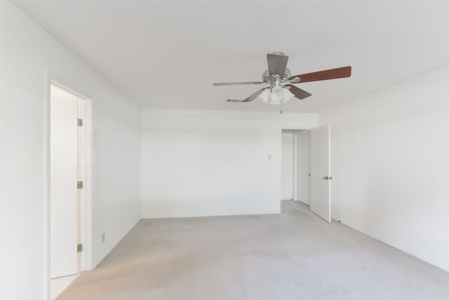 spare room with ceiling fan