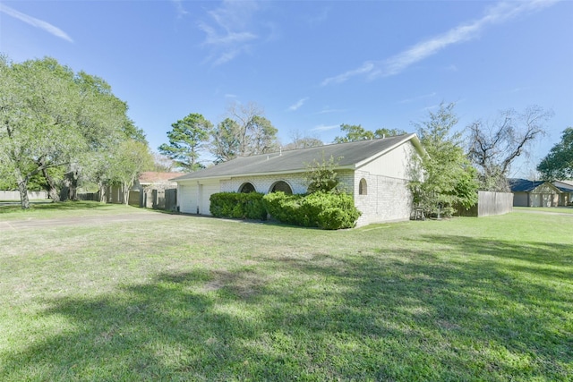 view of home's exterior featuring a lawn