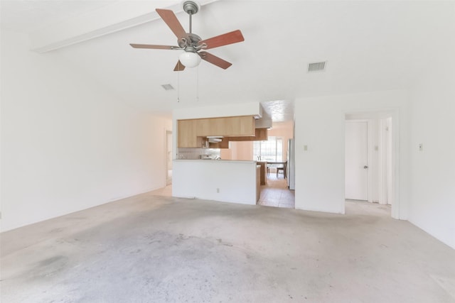 unfurnished living room featuring vaulted ceiling with beams, ceiling fan, and light colored carpet