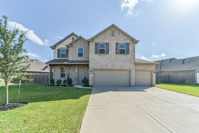 view of front of house with a front lawn and a garage