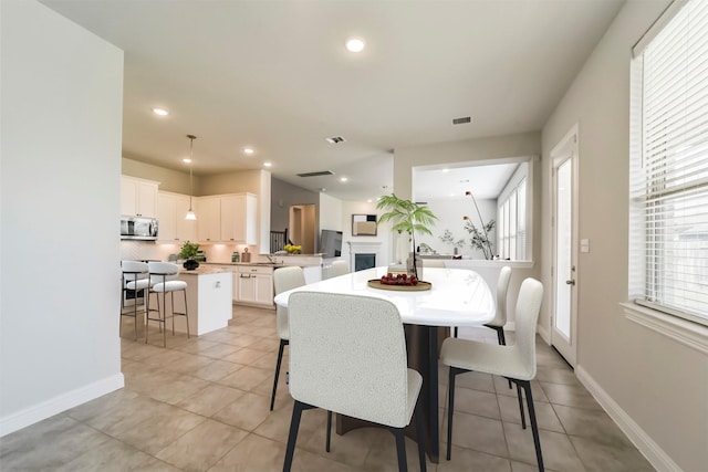 dining room with light tile patterned floors