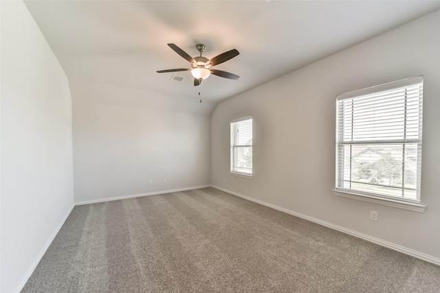 carpeted empty room with ceiling fan